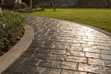 Decorative sturdy concrete tiles for walkways, patios and backyard parking  - pavement for the lot outside the house - country house planning and  architecture 2841228 Stock Photo at Vecteezy