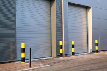 Concrete Bollards Outside An Industrial Building