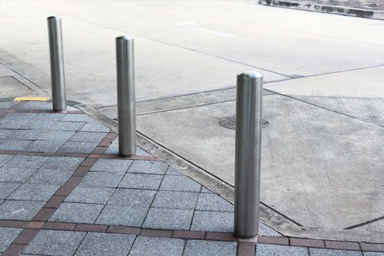 Steel Bollards On A Sidewalk